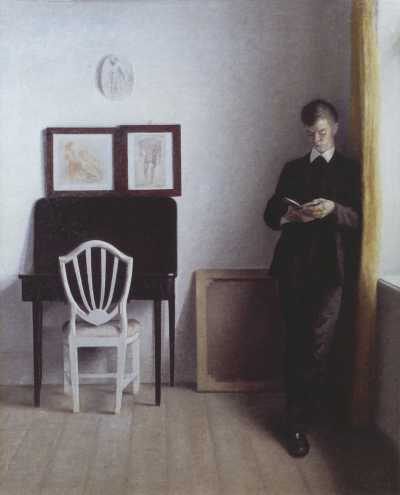Interior with a Young Man Reading